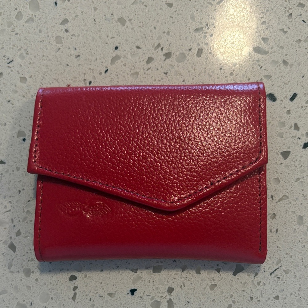 Red leather wallet
Archangel Uriel stamp